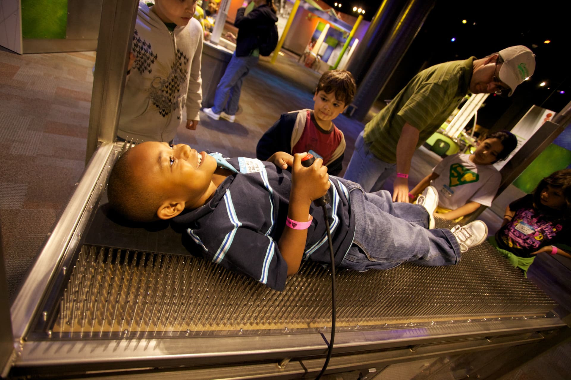 Child on the bed of nails exhibit